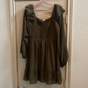 Long sleeve dress. Sleeves are sheer. Dark olive color.